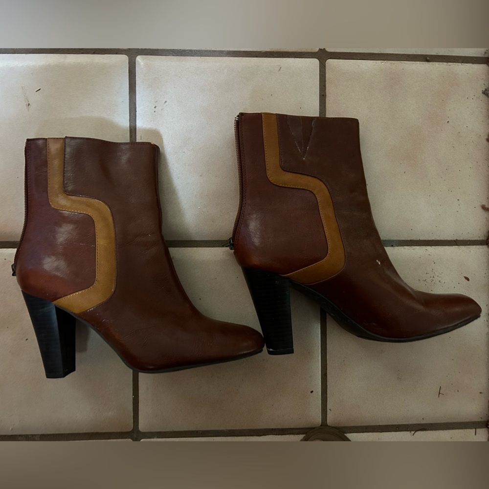 Brown and tan heeled dress boots. Worn once; size 8.